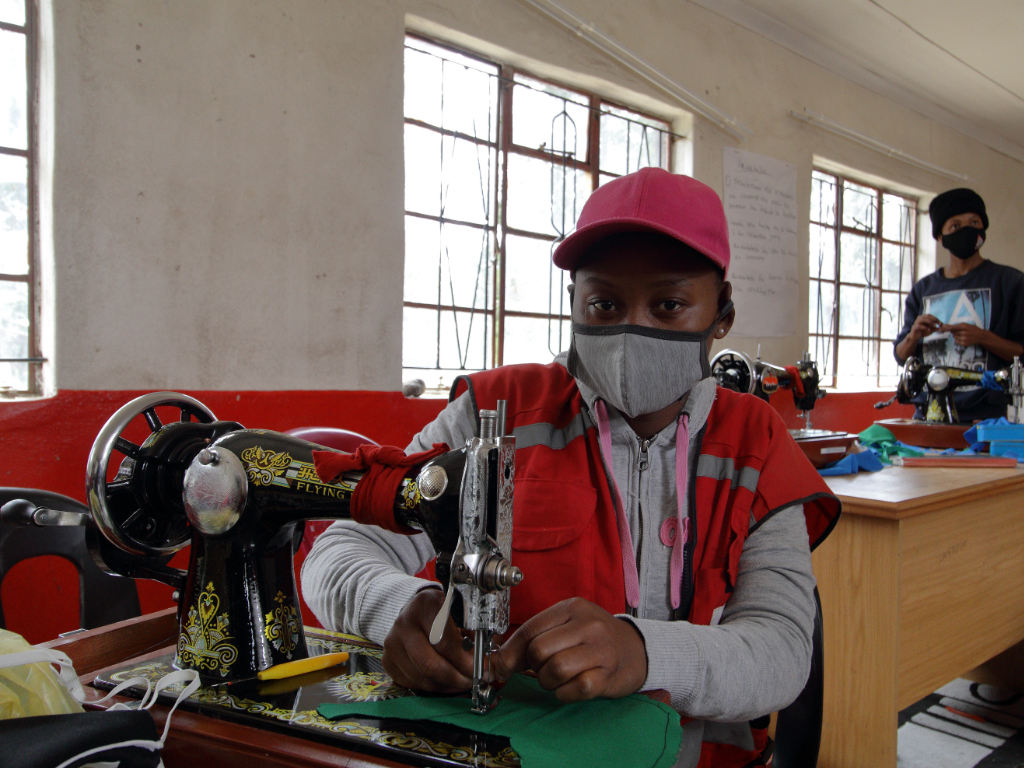 Person working in Lethoso - Dolen Cymru